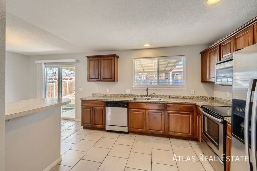 14972 E 45th Ave - Photo 2 of 16