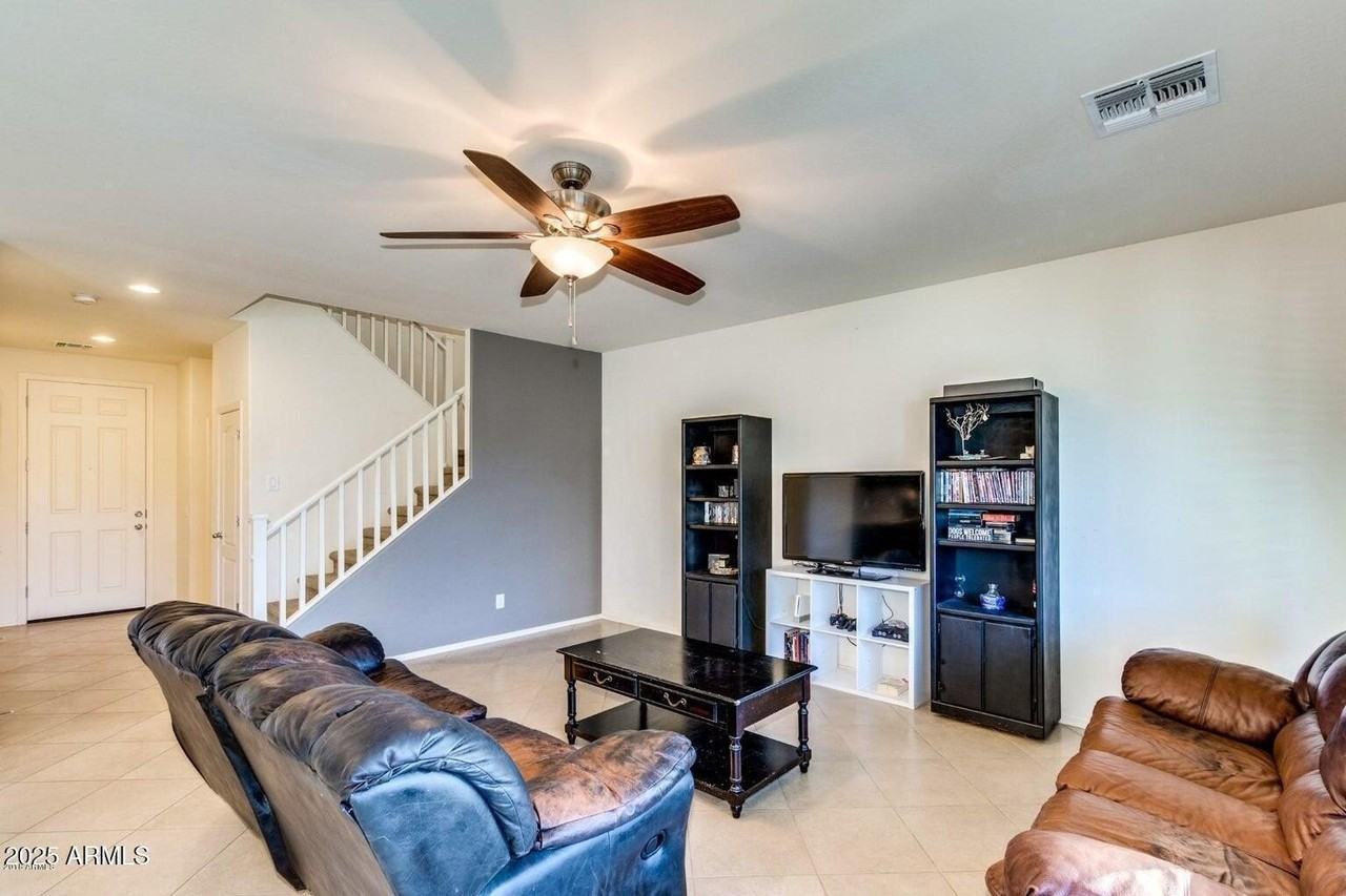 12057 W Rowel Rd - Photo 3 of 20