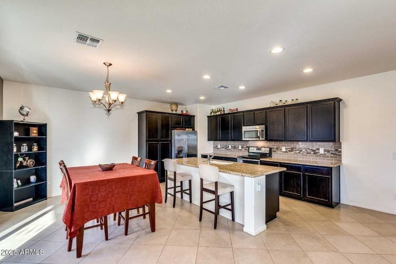 12057 W Rowel Rd - Photo 4 of 20