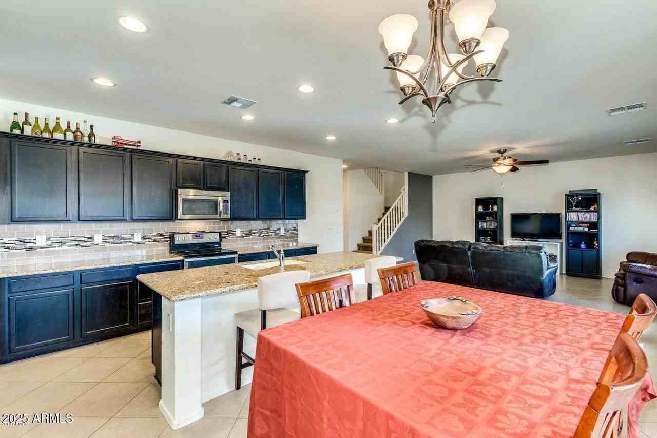 12057 W Rowel Rd - Photo 6 of 20