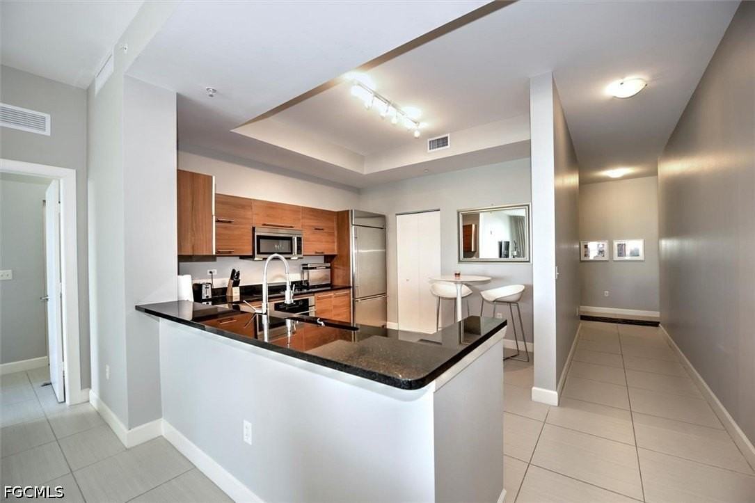 3000 Oasis Grand Blvd #407 - Photo 5 of 30