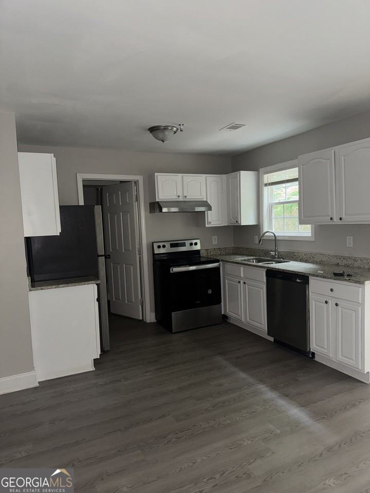1240 Pinedale Cir Nw - Photo 4 of 15