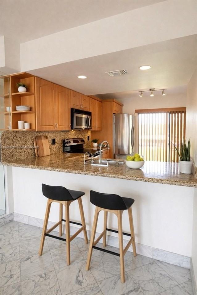 1283 W 51st Pl #12 - Photo 6 of 42