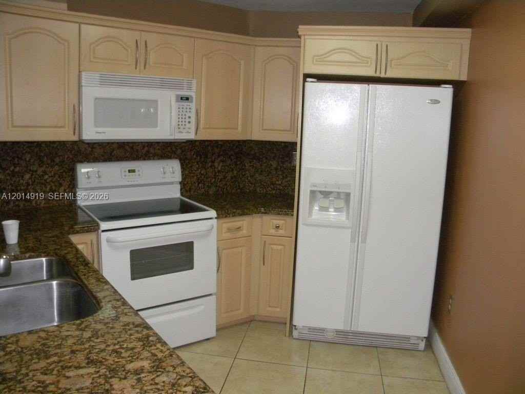 10249 Nw 9th Street Cir #104-8 - Photo 3 of 16