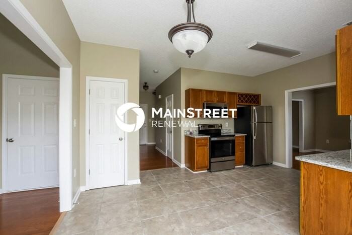 11717 Black Maple Ave - Photo 5 of 15