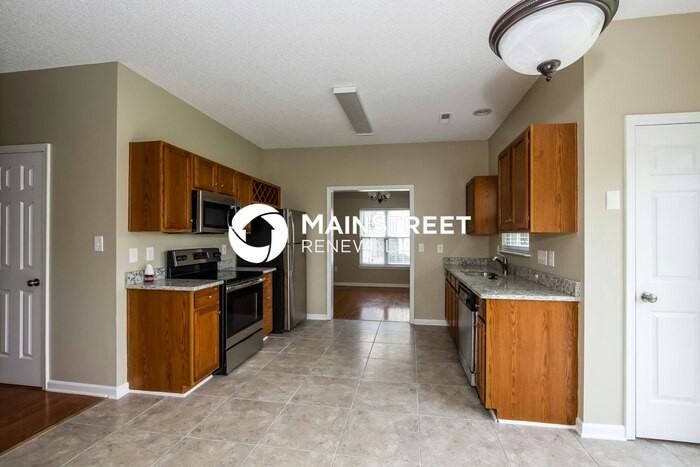 11717 Black Maple Ave - Photo 7 of 15