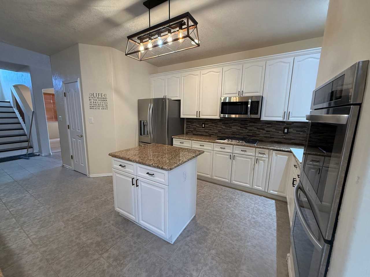 6400 Freemont Hills Loop Ne - Photo 3 of 12