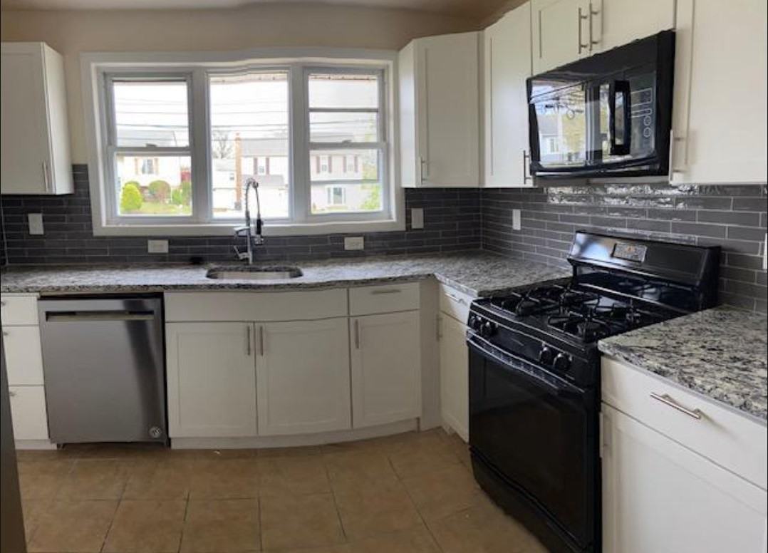 7556 Baxter Ave - Photo 3 of 6