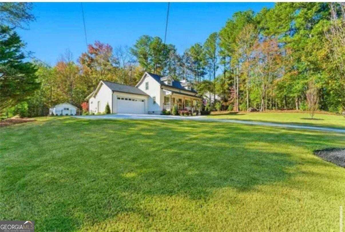 5006 Suwanee Dam Rd - Photo 2 of 9