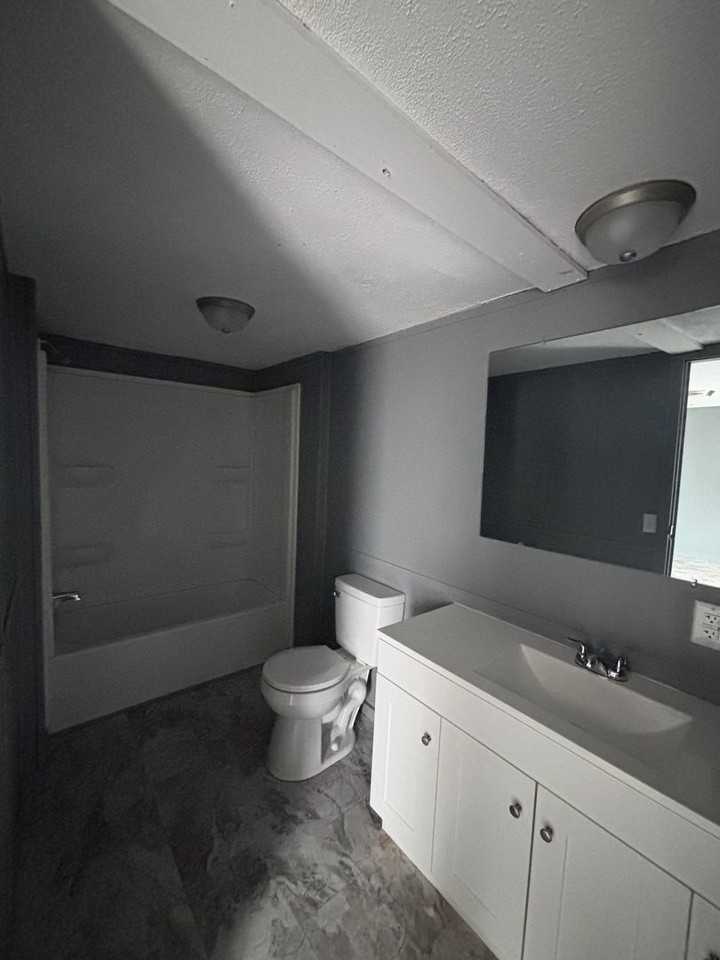 Miller Loop Manor MHP - Photo 5 of 6