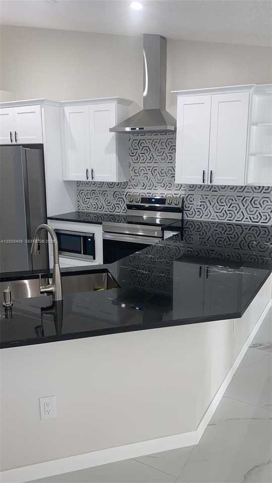 1198 Sw Ingrassina Ave - Photo 5 of 16