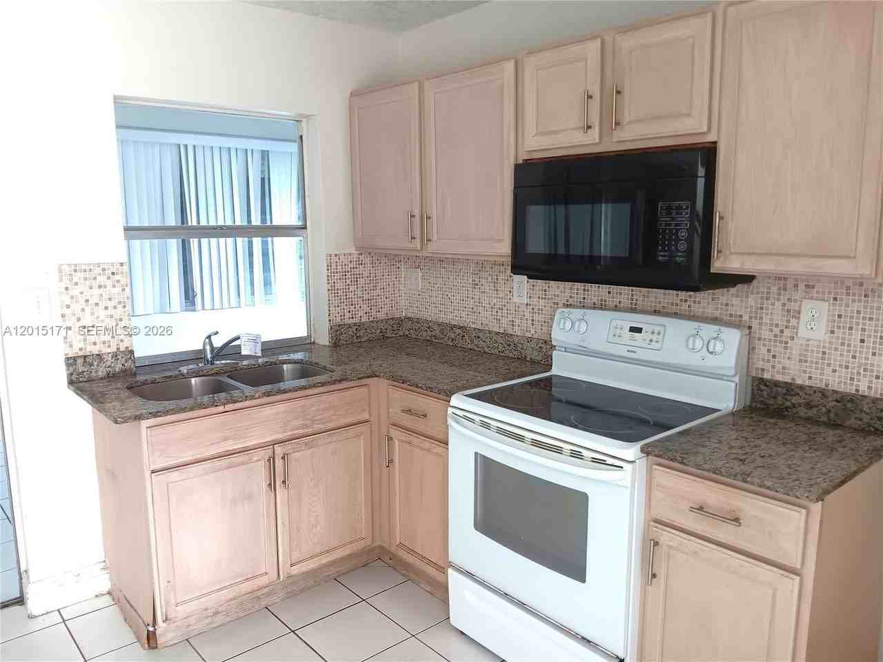 7004 Nw 67th Ave - Photo 3 of 11