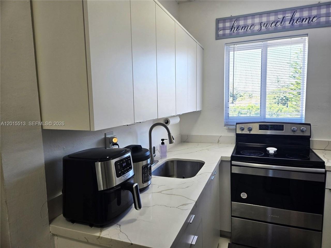 384 Tamiami Canal Rd #1 - Photo 4 of 14