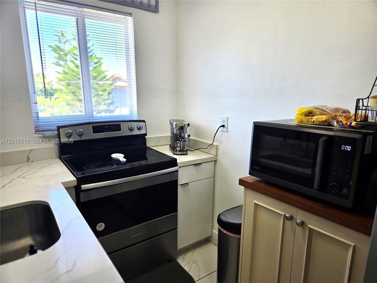 384 Tamiami Canal Rd #1 - Photo 5 of 14