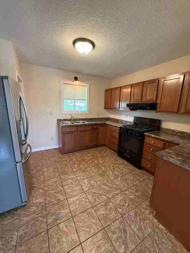 1337 Avenue C - Photo 4 of 11