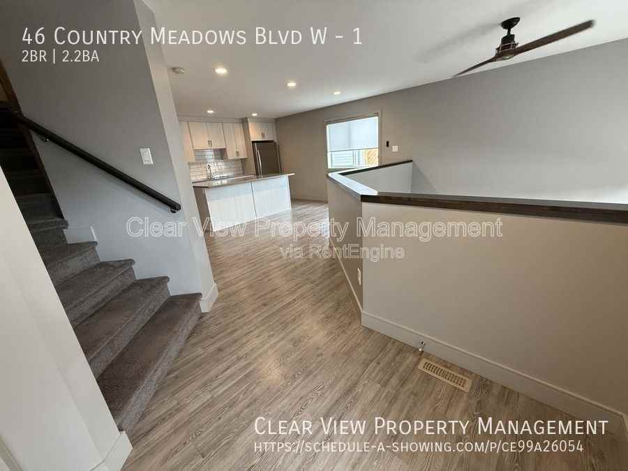 46 Country Meadows Blvd W #1 - Photo 3 of 22