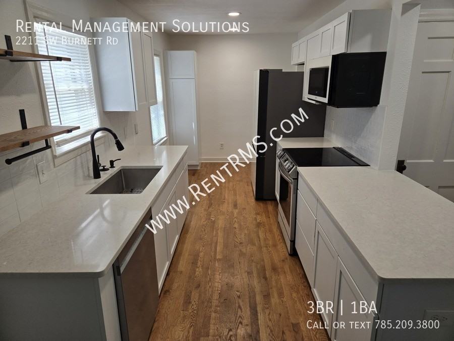 2211 Sw Burnett Rd - Photo 7 of 22