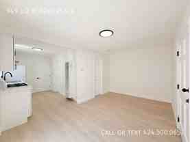 949 1/2 W 62nd Pl - Photo 1 of 1