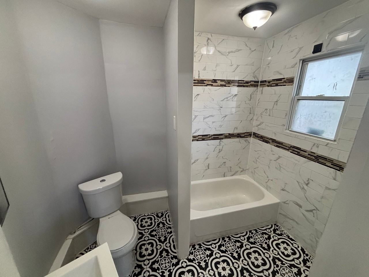 52 Harrison Ave - Photo 2 of 4