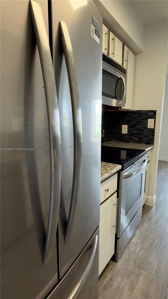 2445 Nw 33rd St #1404 - Photo 5 of 47