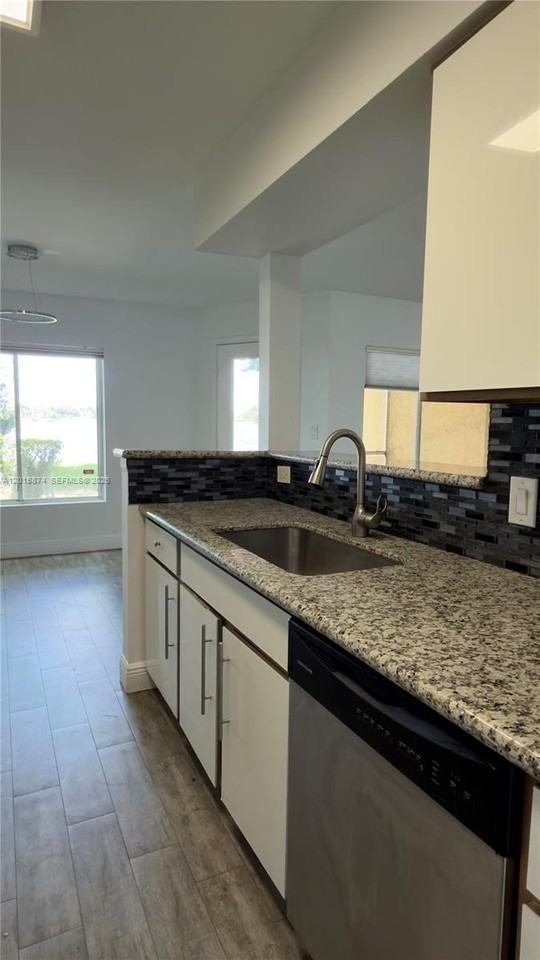 2445 Nw 33rd St #1404 - Photo 6 of 47