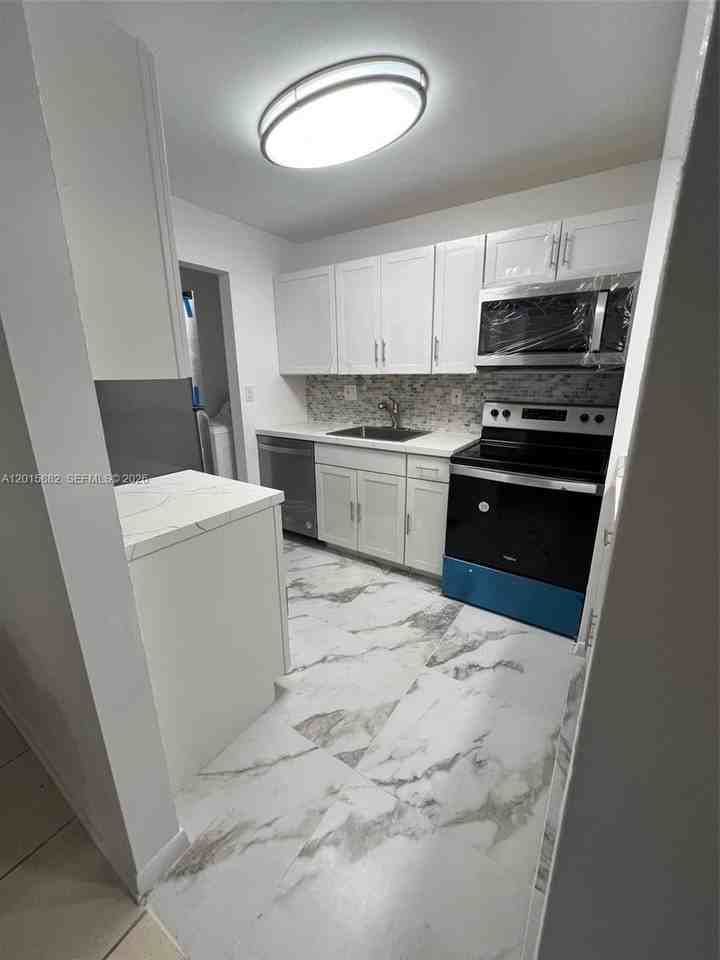 469 Ne 207th Ln #102 - Photo 2 of 14