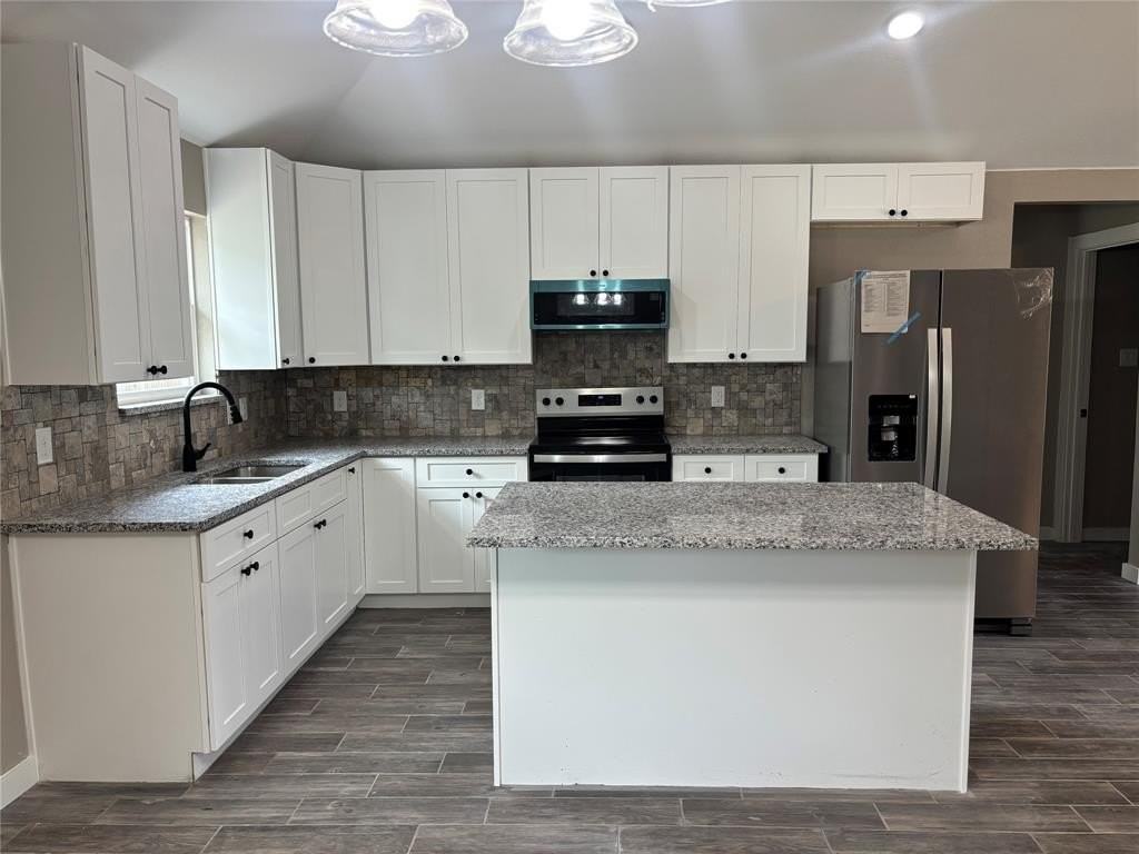 301 Nw 23rd St - Photo 6 of 13