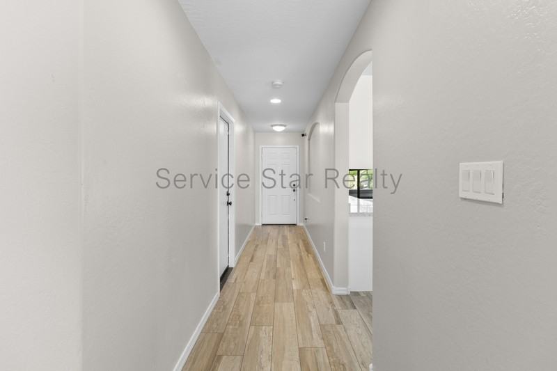 7718 S 48th Ln - Photo 4 of 24