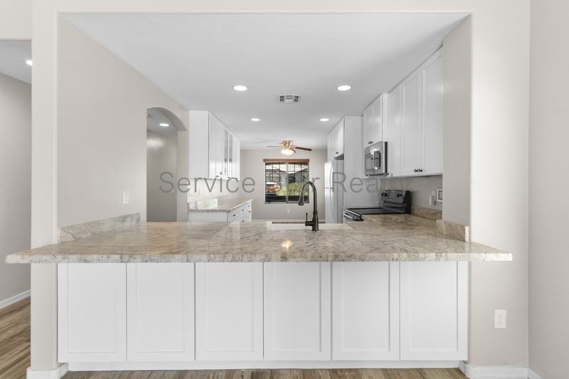 7718 S 48th Ln - Photo 5 of 24