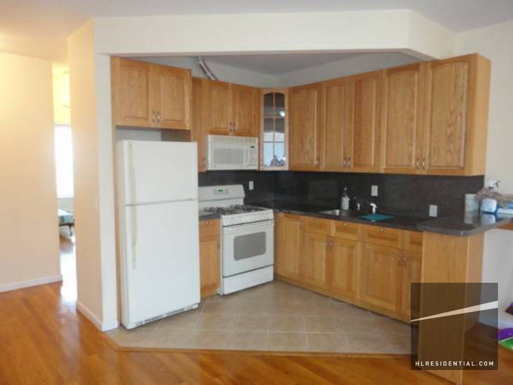 57-51 Myrtle Ave 1 - Photo 2 of 3