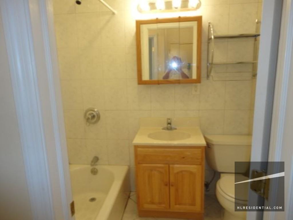 57-51 Myrtle Ave 1 - Photo 3 of 3