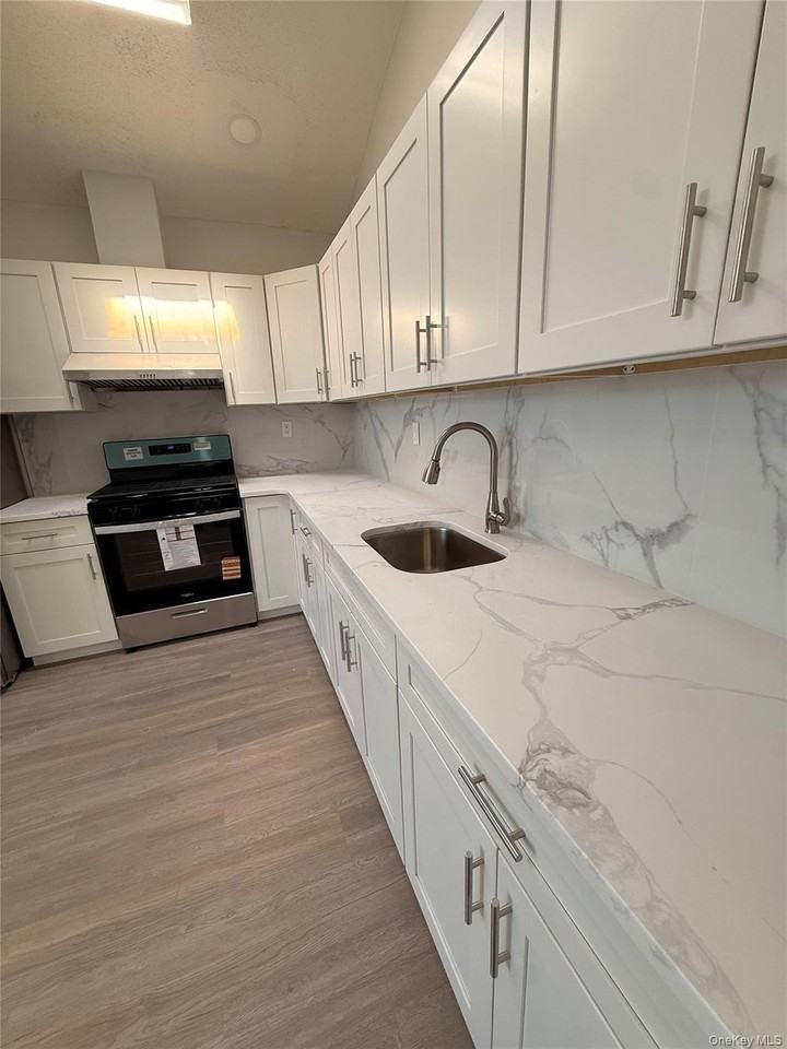 1977 73rd St #1FL - Photo 2 of 10