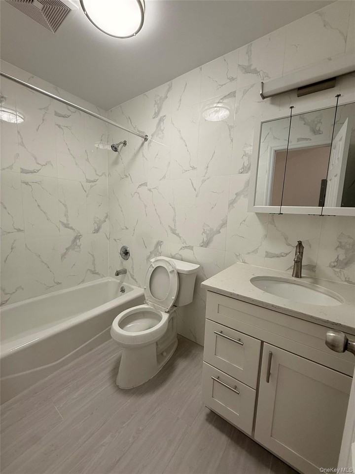 1977 73rd St #1FL - Photo 5 of 10