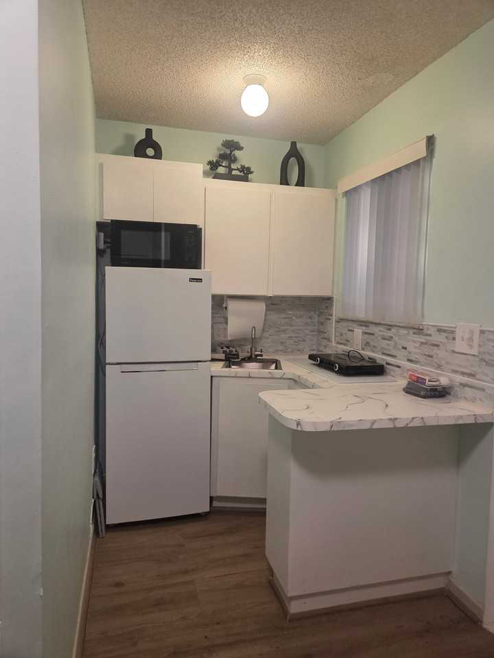 5690 W 9th Ln - Photo 3 of 12