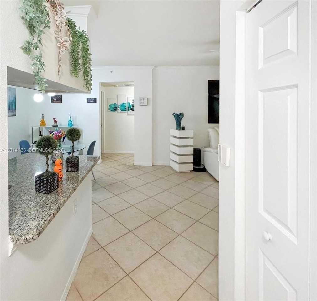 6533 Emerald Dunes Dr #208 - Photo 2 of 19