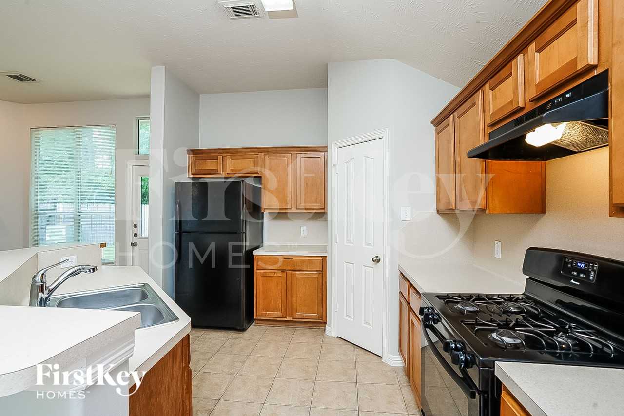 4531 Bridgevillage Dr - Photo 6 of 16