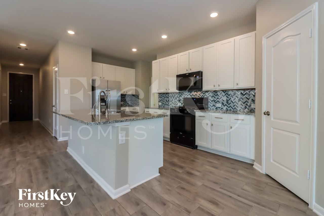 22235 Davenport Downs Ln - Photo 6 of 16