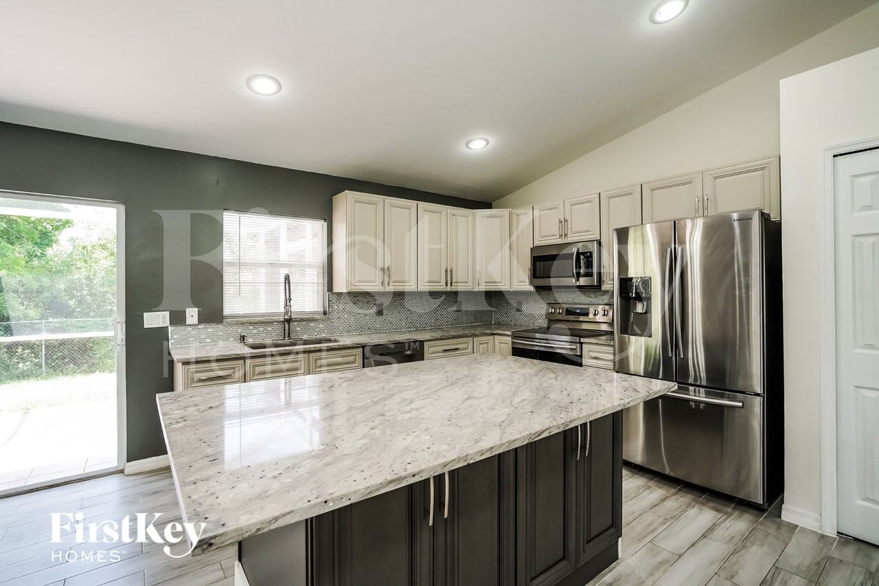 8451 Caloosa Rd - Photo 4 of 16