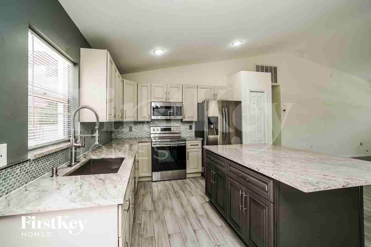 8451 Caloosa Rd - Photo 5 of 16