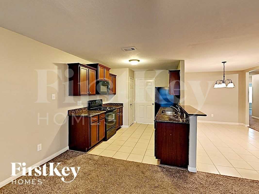 24543 Eagles Claw Dr - Photo 4 of 13