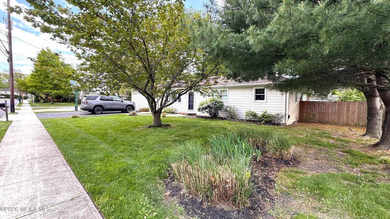 1210 Allaire Ave - Photo 2 of 16