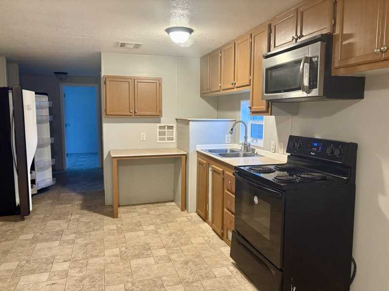 715 Center St E Trlr #127 - Photo 4 of 13