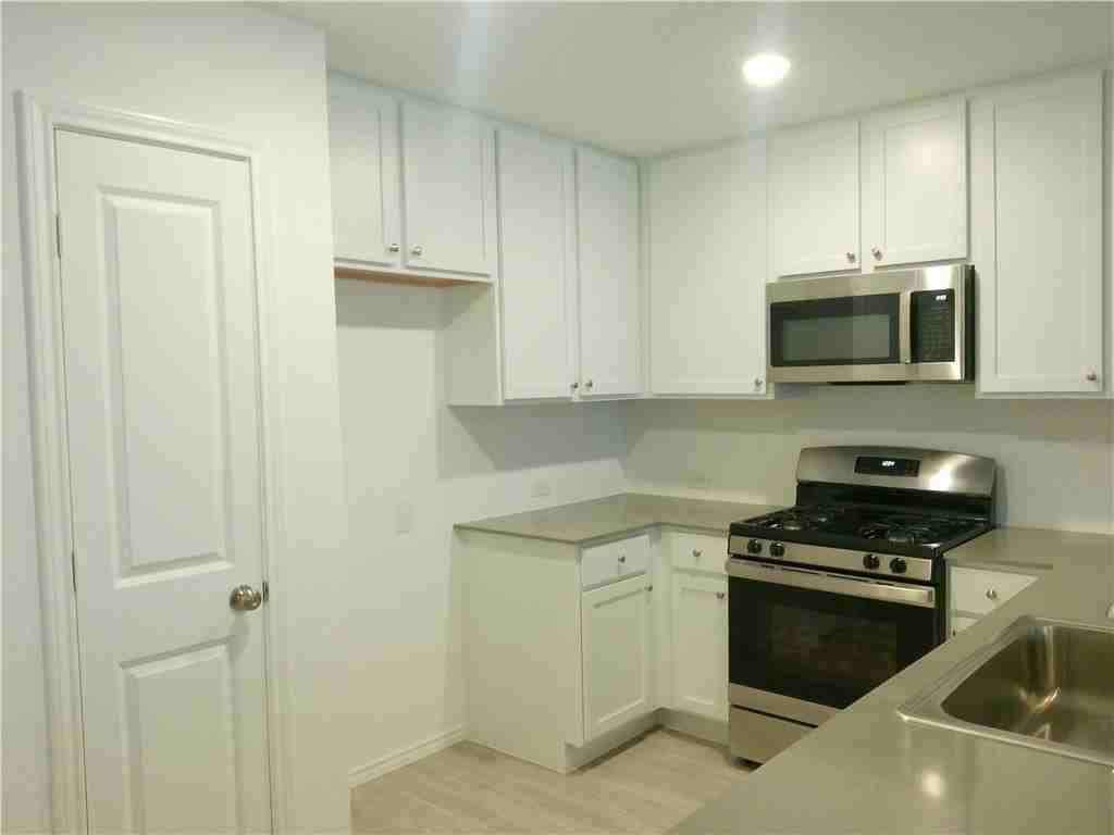 7705 Wonder Woman Dr - Photo 2 of 14