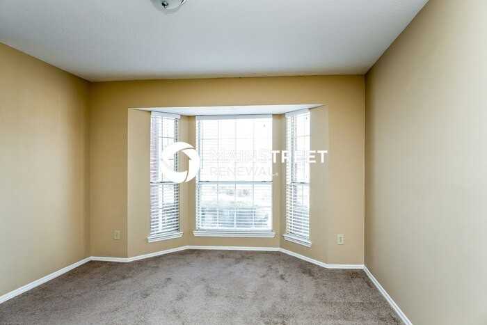 606 Woodstone Rd - Photo 3 of 15