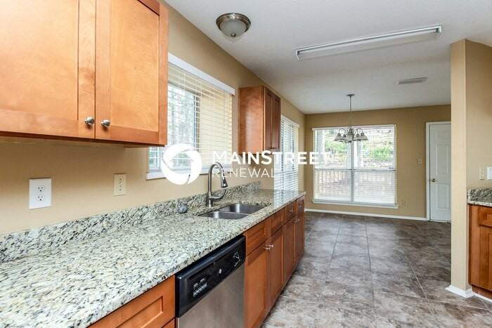 606 Woodstone Rd - Photo 5 of 15