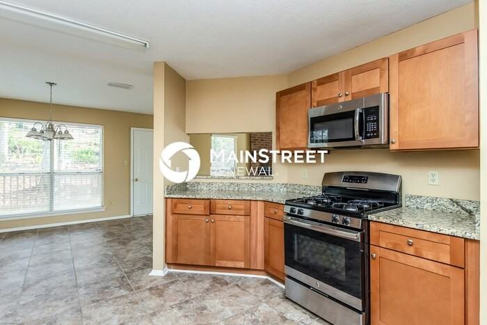 606 Woodstone Rd - Photo 6 of 15