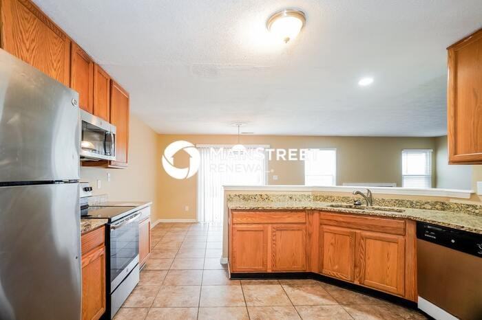 5731 Congressional Pl - Photo 7 of 17