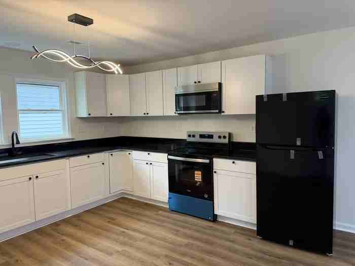 104 Howard St - Photo 4 of 14