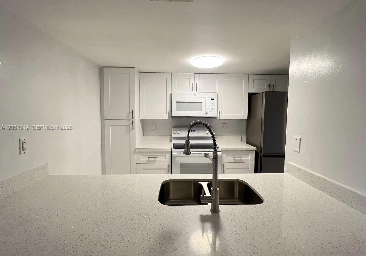 7075 Nw 186th St #C205 - Photo 2 of 4