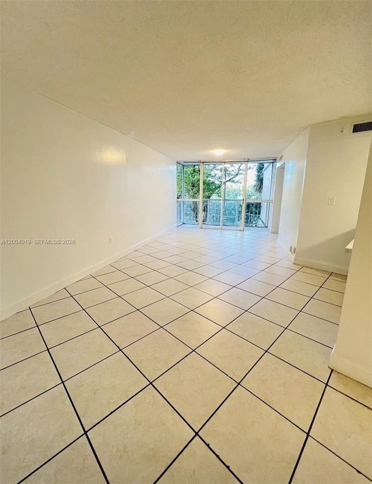 7075 Nw 186th St #C205 - Photo 3 of 4